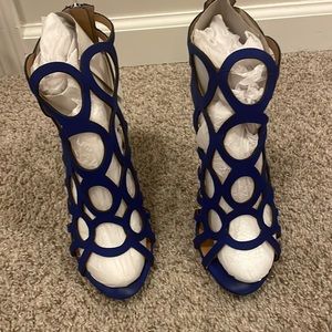 Size 10 Blue suede cut out sandals from JustFab. Worn twice.